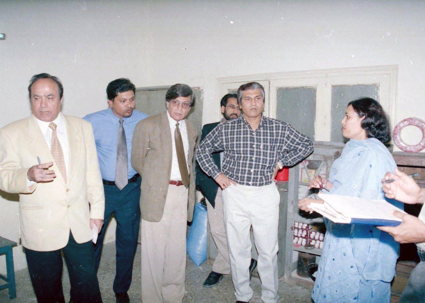 The same discussion continues: questions, clarifications and a folder of papers that will become part of the record.